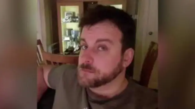 Selfie of Stephen McCullagh. Brown hair wearing a brown shirt