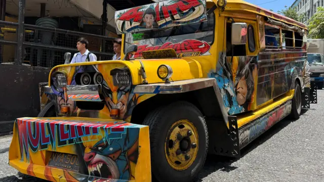A yellow colour jeepney in Manila