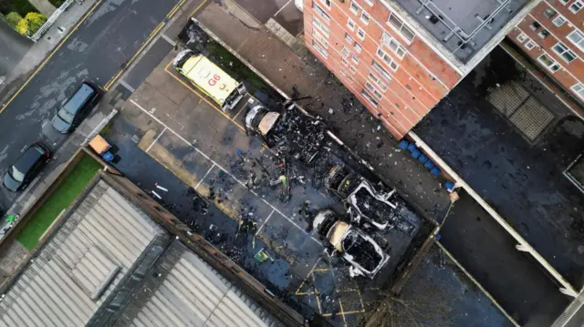 An aerial view of the damaged ambulances