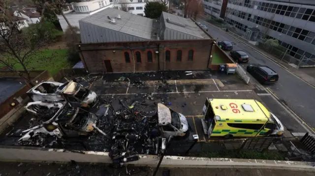 Aerial view of burned out ambulances