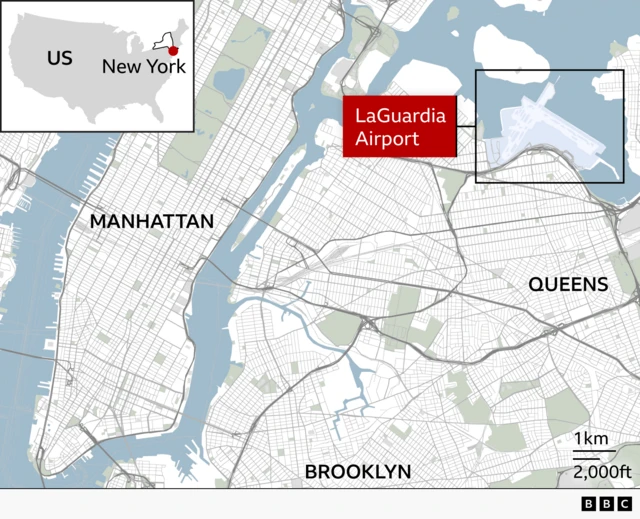 An aerial (satellite) view of LaGuardia Airport in New York. Key details shown: A highlighted runway labelled Runway 4 with a yellow path indicating the plane’s movement. A circled point more than halfway up the runway marks the location of the collision with the firefighting vehicle. A small inset map of the United States highlights New York’s location. A scale in the bottom right shows distance (200m / 1,000 ft).
