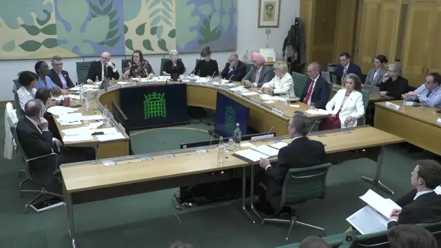 Wide shot of Liaison committee