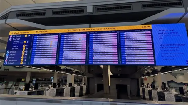 A flight board at the airport