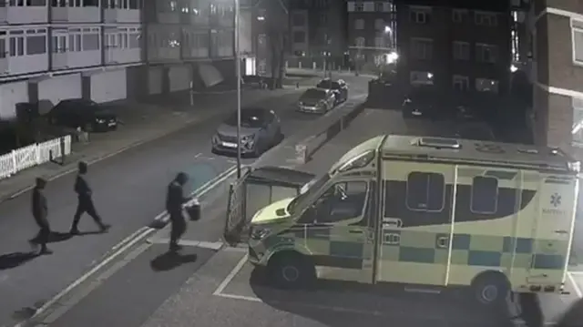 CCTV showed three suspects walking towards one of the ambulances at 01:36 GMT on Monday morning