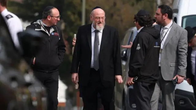 Chief Rabbi Ephraim Mirvis at the scene in Golders Green