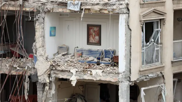A damaged building in Tehran, pictured on 23 March
