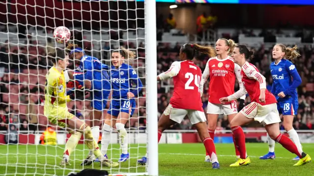 Chelsea's Kadeisha Buchanan collides into Arsenal goalkeeper Anneke Borbe as she attempts to get to the ball during the UEFA Women's Champions League match at the Emirates Stadium, London