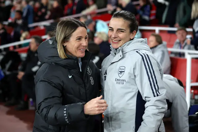 Sonia Bompastor, Manager of Chelsea, and Renee Slegers, Manager of Arsenal, embrace prior to the UEFA Women's Champions League 2025/26 Quarter-finals First Leg match between Arsenal and Chelsea at Arsenal Stadium
