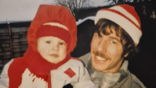 Ian with Lee as a baby