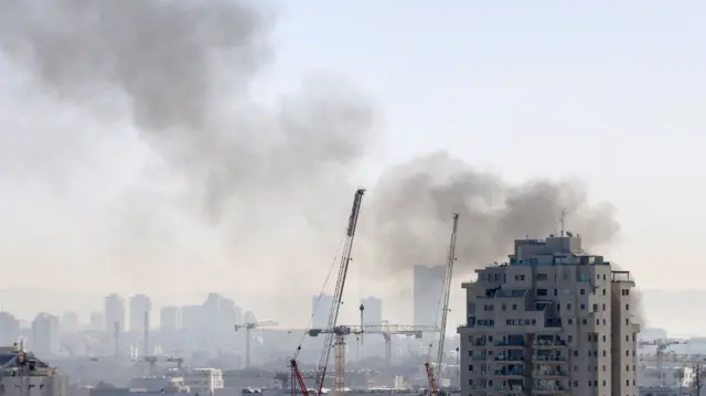 Smoke rises following Iranian missile barrages in central Israel, amid the U.S.-Israel conflict with Iran, in Tel Aviv, Israel, March 24, 2026.