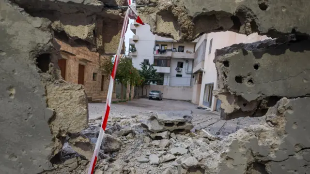 A close-up of a hole in a wall in Beirut