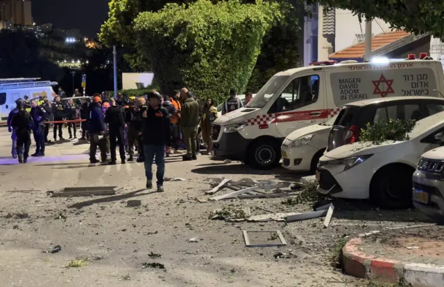 Debris strewn onto the streets of Nesher.