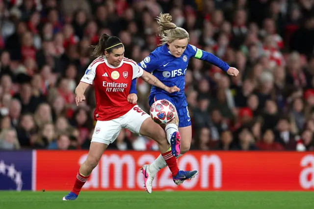 Mariona Caldentey of Arsenal and Erin Cuthbert of Chelsea battle for possession during the UEFA Women's Champions League 2025/26 Quarter-finals First Leg match between Arsenal and Chelsea at Arsenal Stadium