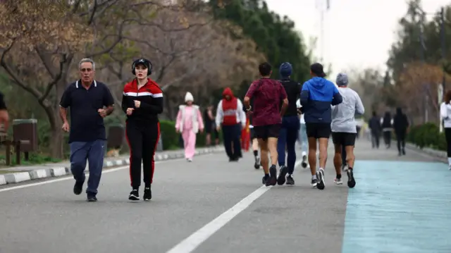 This picture showing people exercising on Tehran's Pardisan Park was taken on Wednesday morning