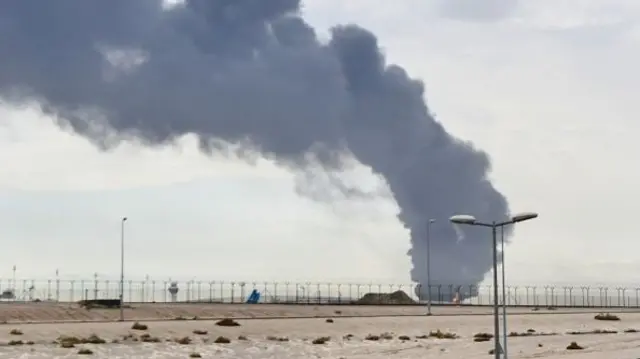 Smoke rises over Kuwait International Airport after an Iranian-sourced drone attack on a fuel depot on the site. Photo: 25 March 2026.