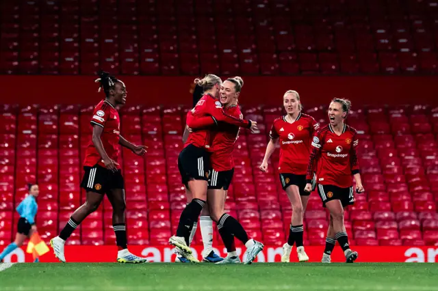 Lundkvist is congratulated after equalising for United