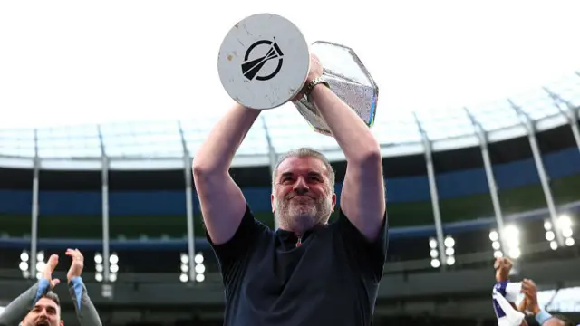 Ange Postecoglou lifts Europa League trophy