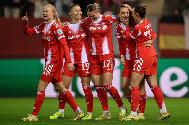 Bayern Munich's Italian midfielder #27 Arianna Caruso (R) celebrates scoring with her teammates