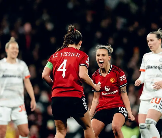 Olme and Le Tissier shout in delight after the equaliser