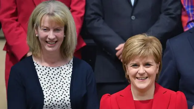 Smiling Shona Robison and Nicola Sturgeon side by side