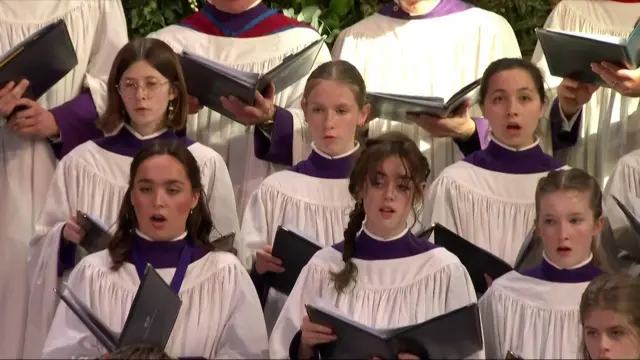 Rows of school children singing