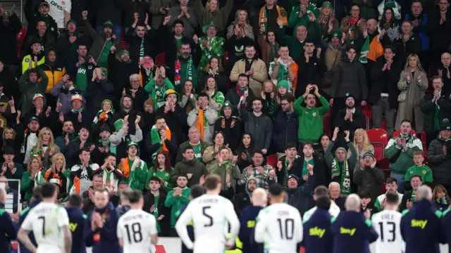Ireland players and fans at full time