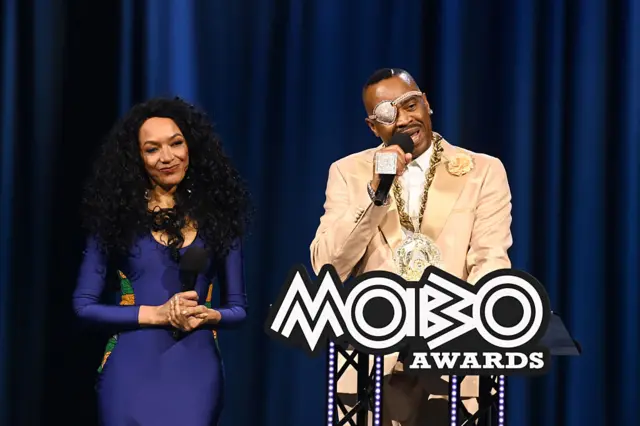 Slick Rick and Kanya King.