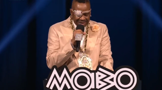 Slick Rick accepting his award