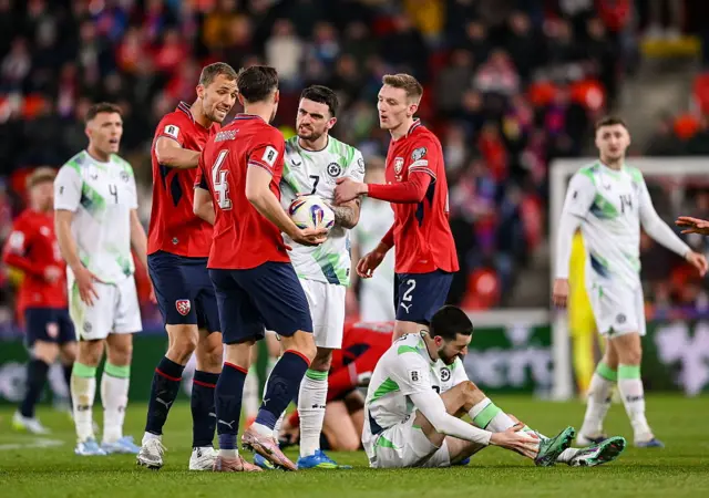 Parrott argues with several Czech players