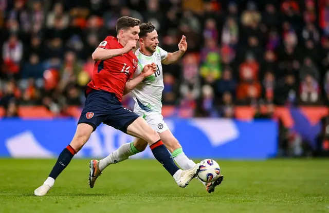 Czech and ROI players battle for the ball