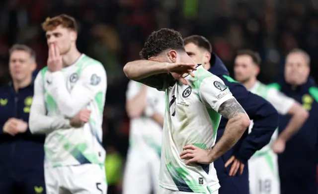 Ireland players hold back tears after losing on penalties