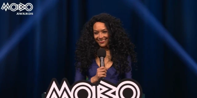 Kanya King presenting an award on the Mobos stage