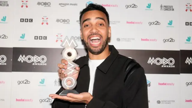 Niko Omilana with Mobo award.