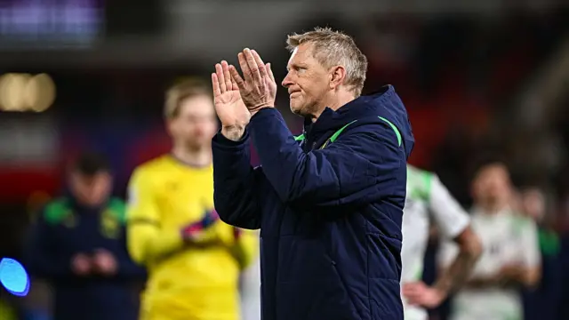 Hallgrimsson claps the fans at full time