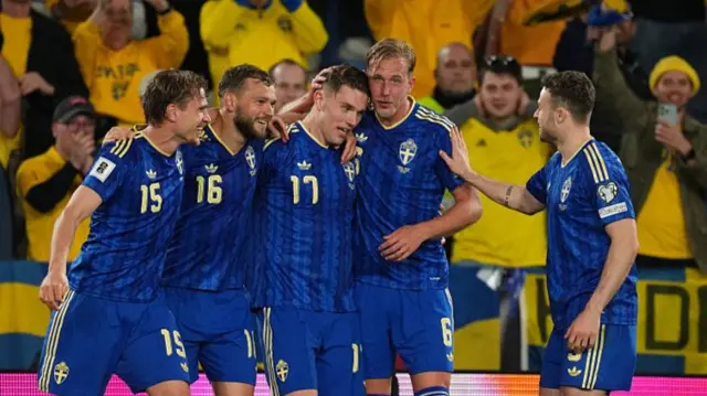 Sweden team-mates congratulate Viktor Gyokaraes