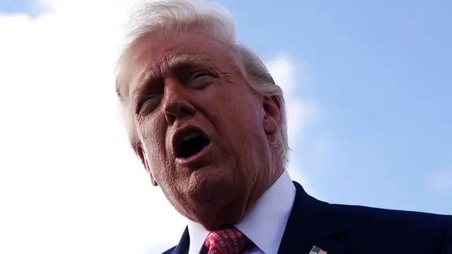 Donald Trump speaks at the airport in Miami