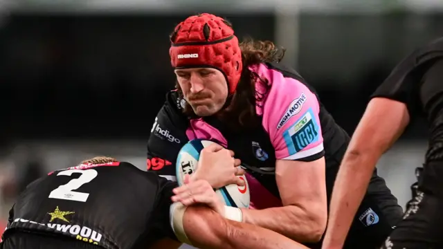 Rory Thornton carries against Sharks in 2024