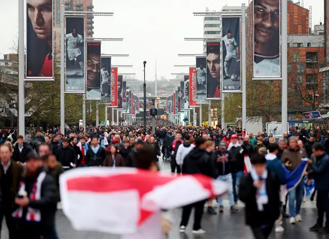 Fans walk up Wembley way