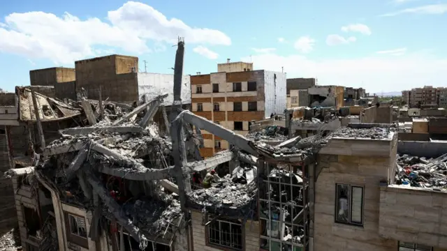 A view of a residential building damaged by a strike, amid the U.S.-Israeli conflict with Iran, in Tehran, Iran