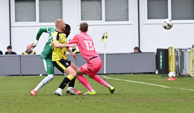 Alassana Jatta scores his and Notts County's second goal at Harrogate