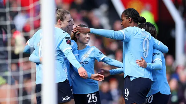 Manchester City players celebrate