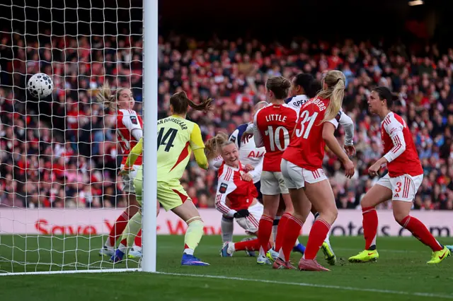Maanum diverts the ball into her own net