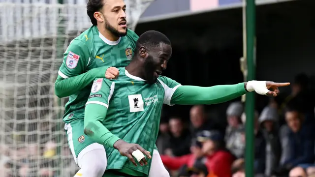 Alassana Jatta celebrates scoring for Notts County against Harrogate