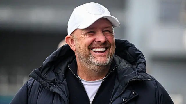 Andy Woodman smiling on the Bromley sideline