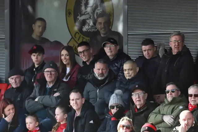Ryan Giggs and Gary Neville watching Salford