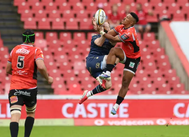 Lions and Dragons contest a high ball