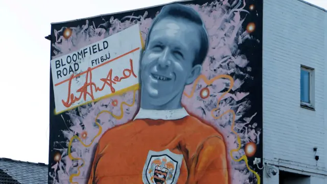 A mural of Sir Stanley Matthews outside Blackpool's Bloomfield Road stadium before the game with Burton