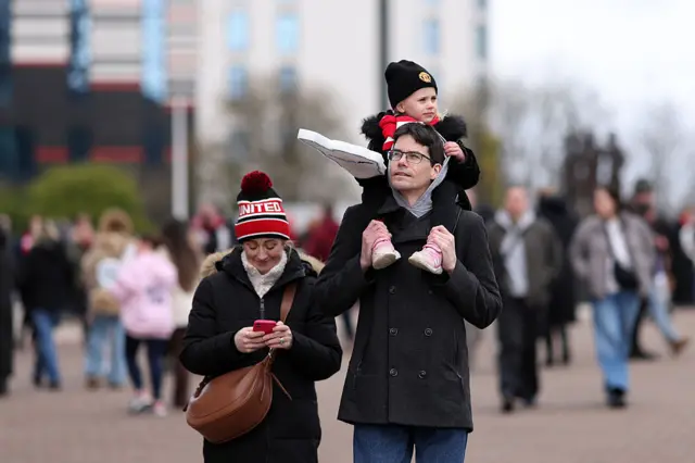 Fans arrive at Old Trafford