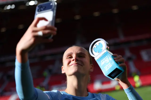 Casparij poses with the player of the match award