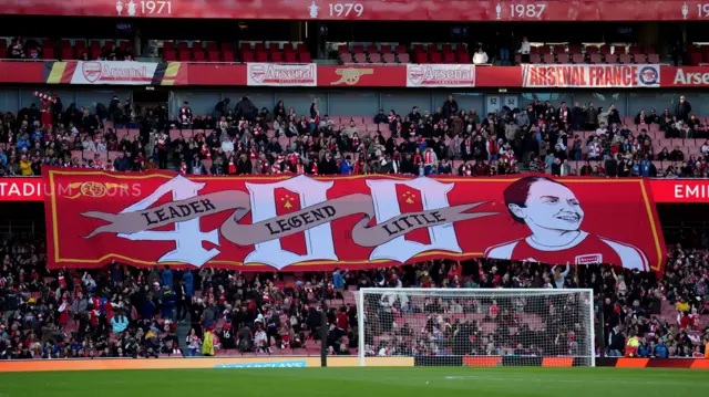 Kim Little banner in the north bank